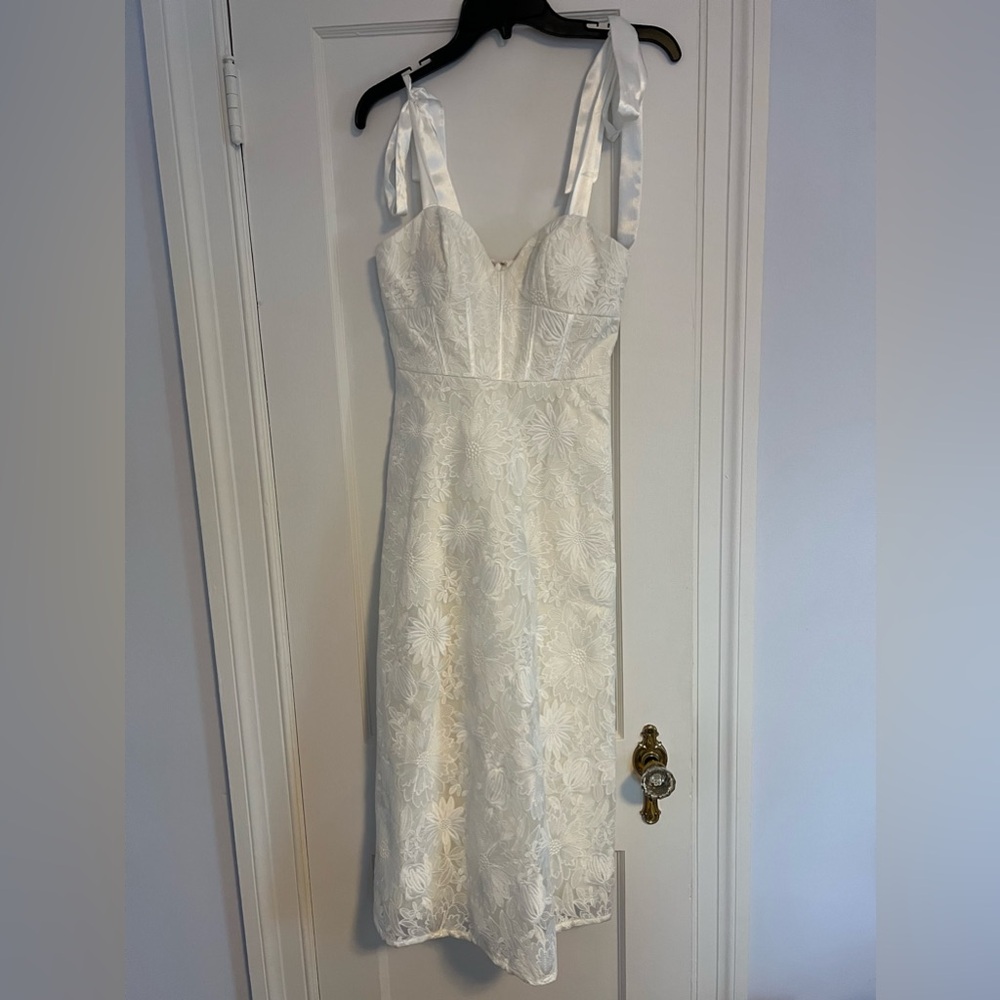 Aidan Mattox white lace dress with silk shoulder ties. Size 0. New with tags.